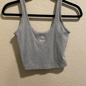 Grey Adidas cropped tank top. Low cut.
